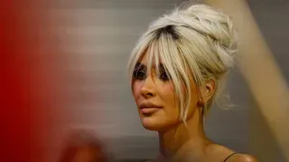 Kim Kardashian Dons A Graduation Cap and Marches Closer to Becoming A Lawyer