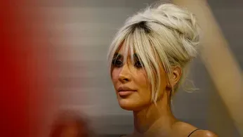 Kim Kardashian Dons A Graduation Cap and Marches Closer to Becoming A Lawyer