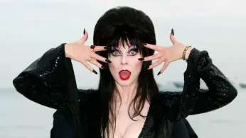 Elvira’s ‘Cookbook From Hell’: Cassandra Peterson Talks Queer Joy, Halloween Legacy, and Coming Out